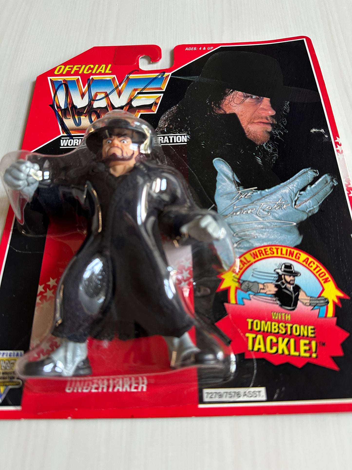 The Undertaker Series 8 WWF Hasbro MOC figure (signed by Paul Bearer)