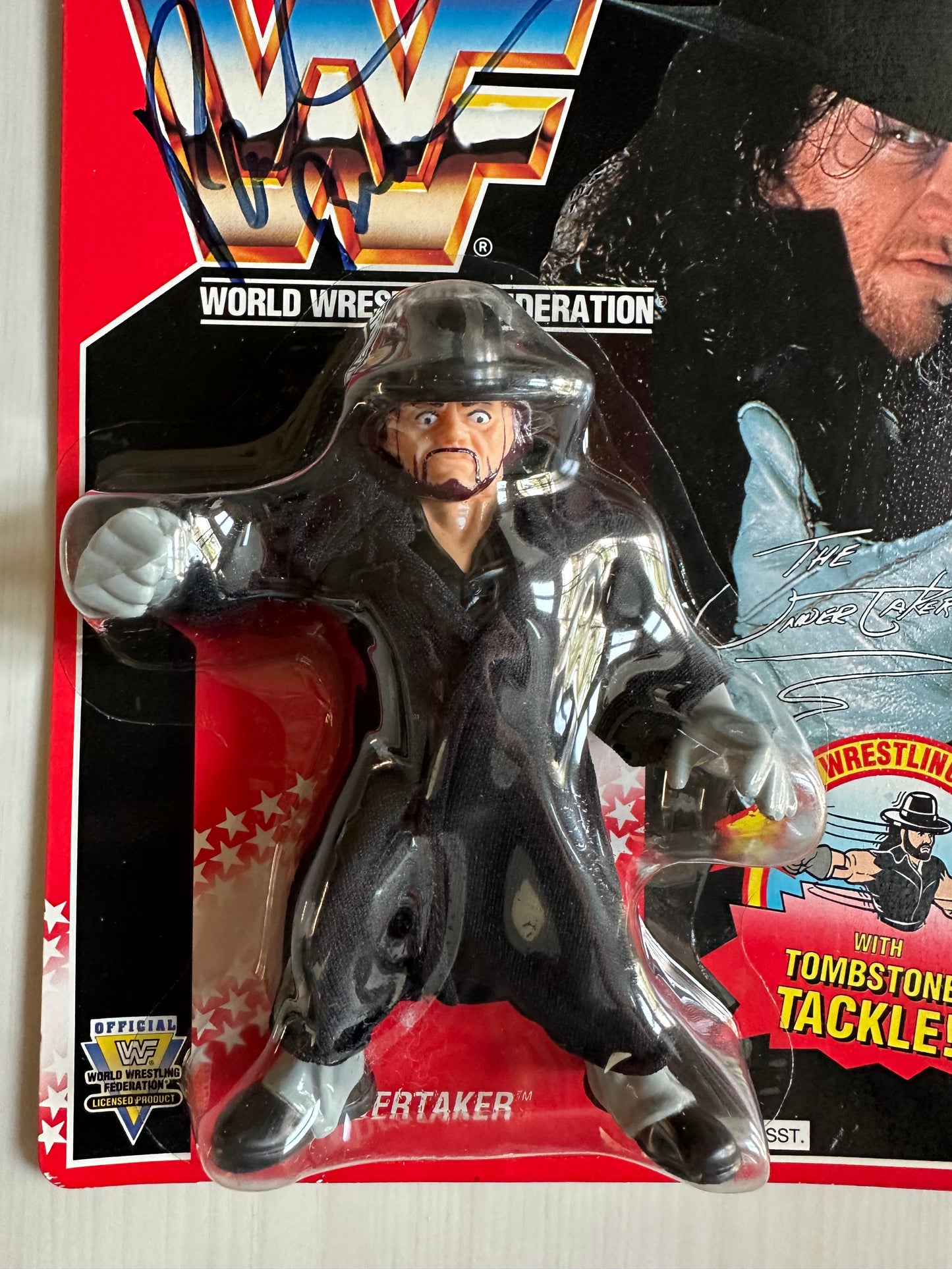 The Undertaker Series 8 WWF Hasbro MOC figure (signed by Paul Bearer)