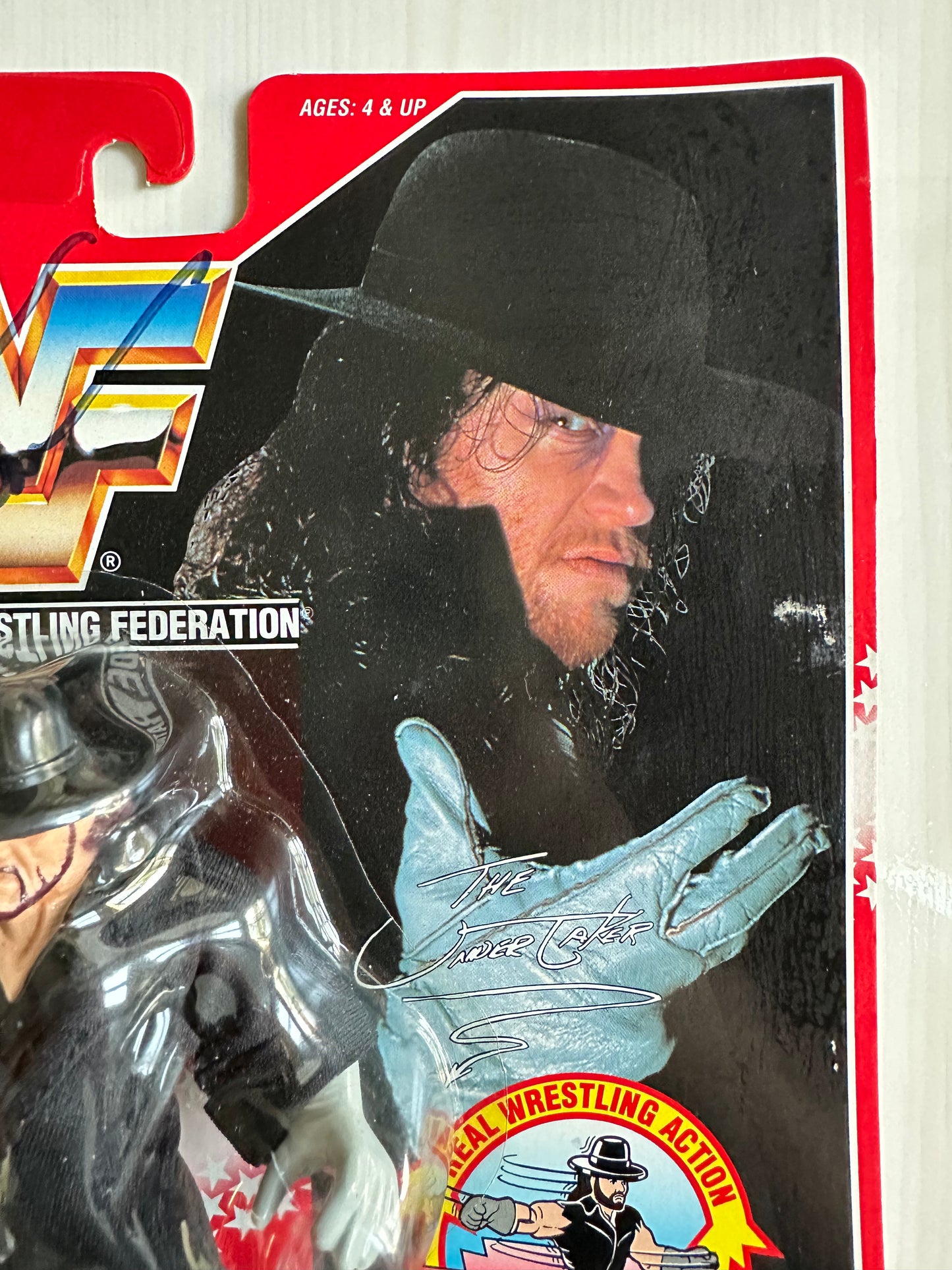 The Undertaker Series 8 WWF Hasbro MOC figure (signed by Paul Bearer)
