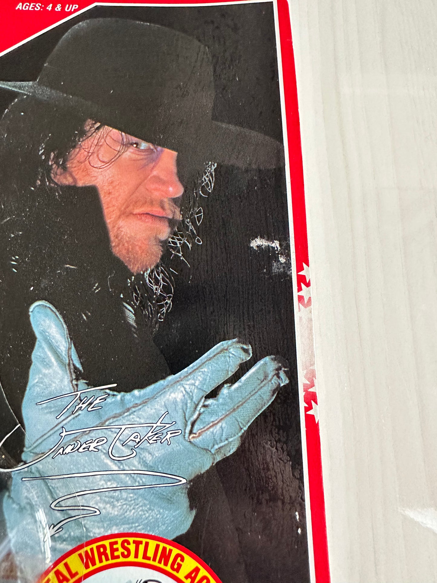 The Undertaker Series 8 WWF Hasbro MOC figure (signed by Paul Bearer)