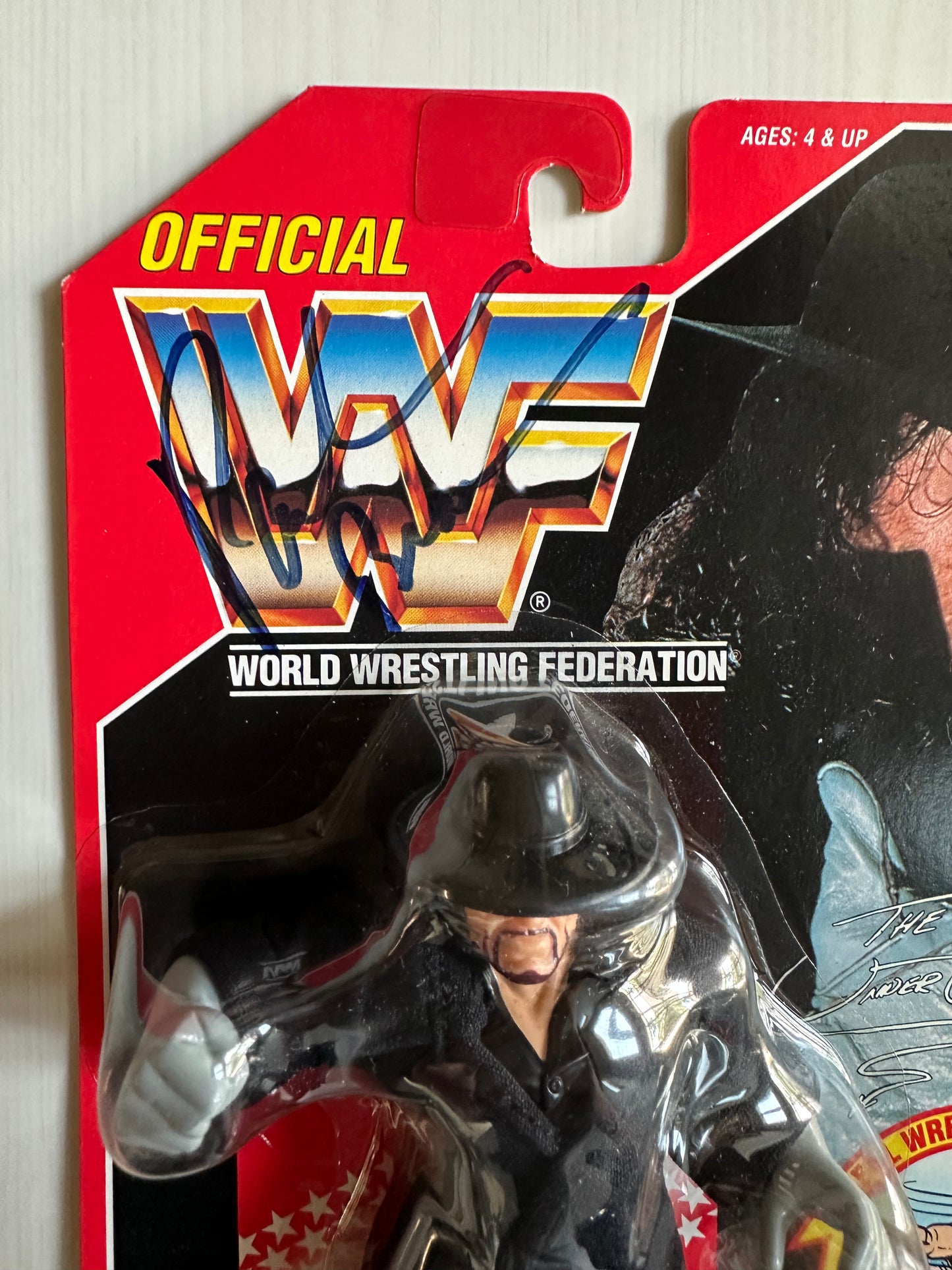 The Undertaker Series 8 WWF Hasbro MOC figure (signed by Paul Bearer)