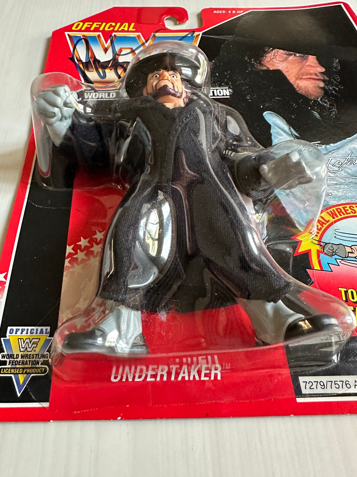 The Undertaker Series 8 WWF Hasbro MOC figure (signed by Paul Bearer)