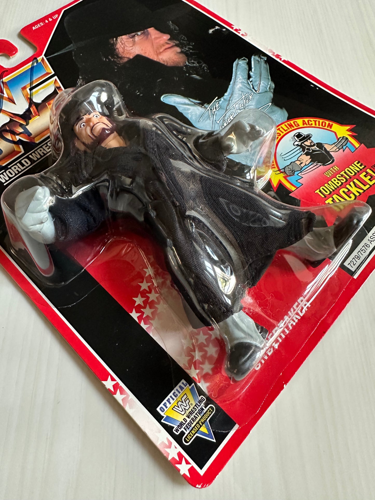 The Undertaker Series 8 WWF Hasbro MOC figure (signed by Paul Bearer)