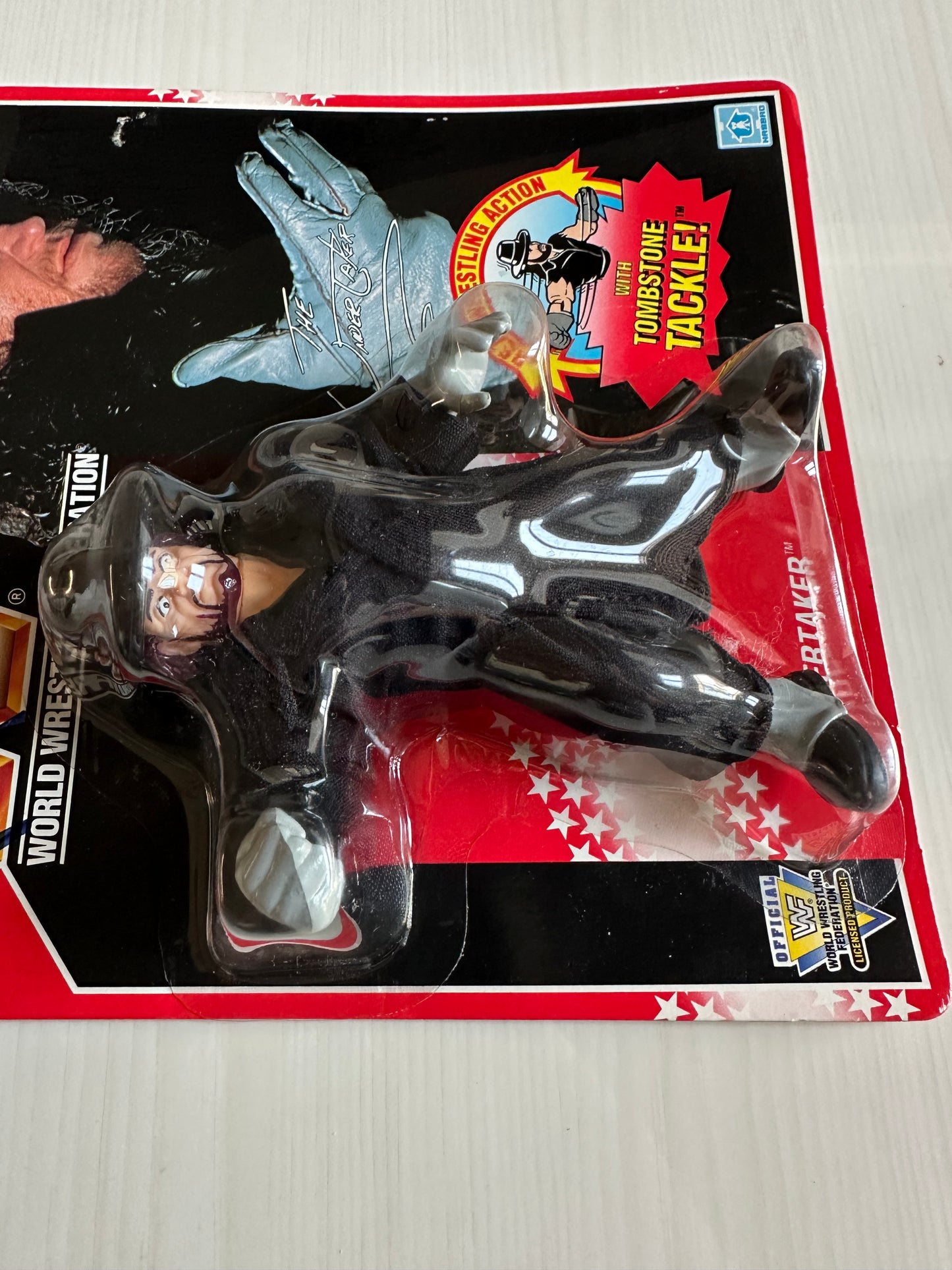 The Undertaker Series 8 WWF Hasbro MOC figure (signed by Paul Bearer)