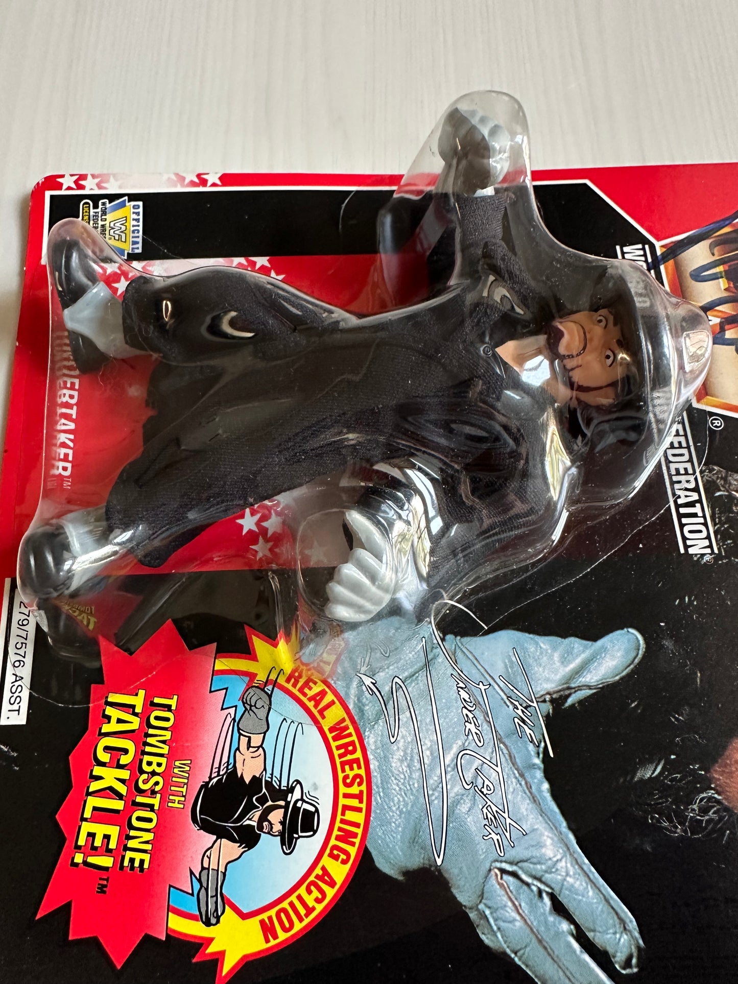 The Undertaker Series 8 WWF Hasbro MOC figure (signed by Paul Bearer)