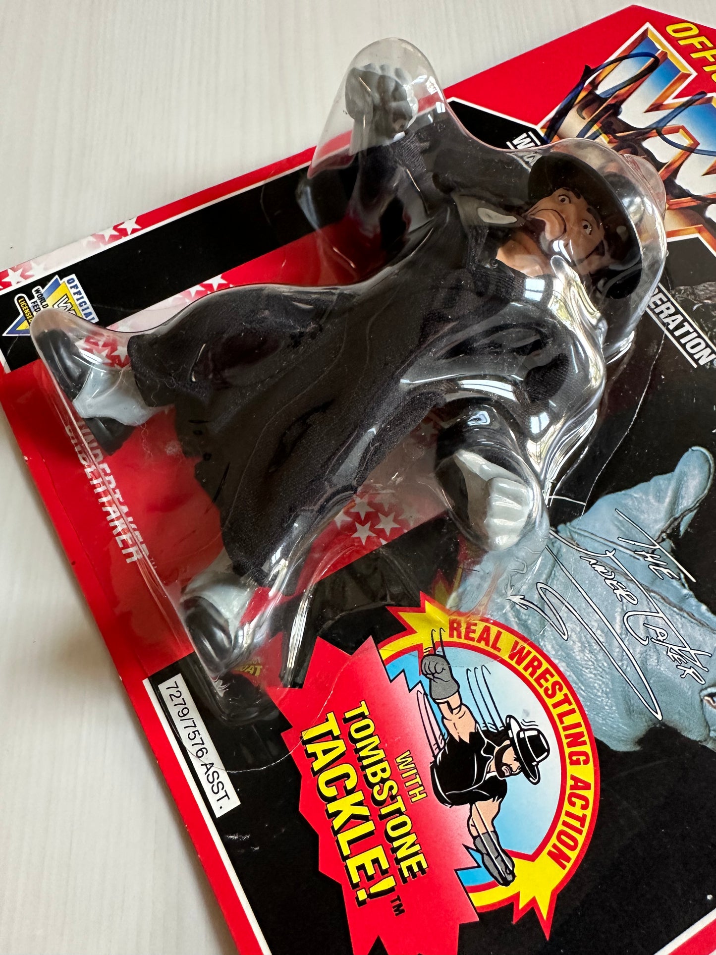 The Undertaker Series 8 WWF Hasbro MOC figure (signed by Paul Bearer)