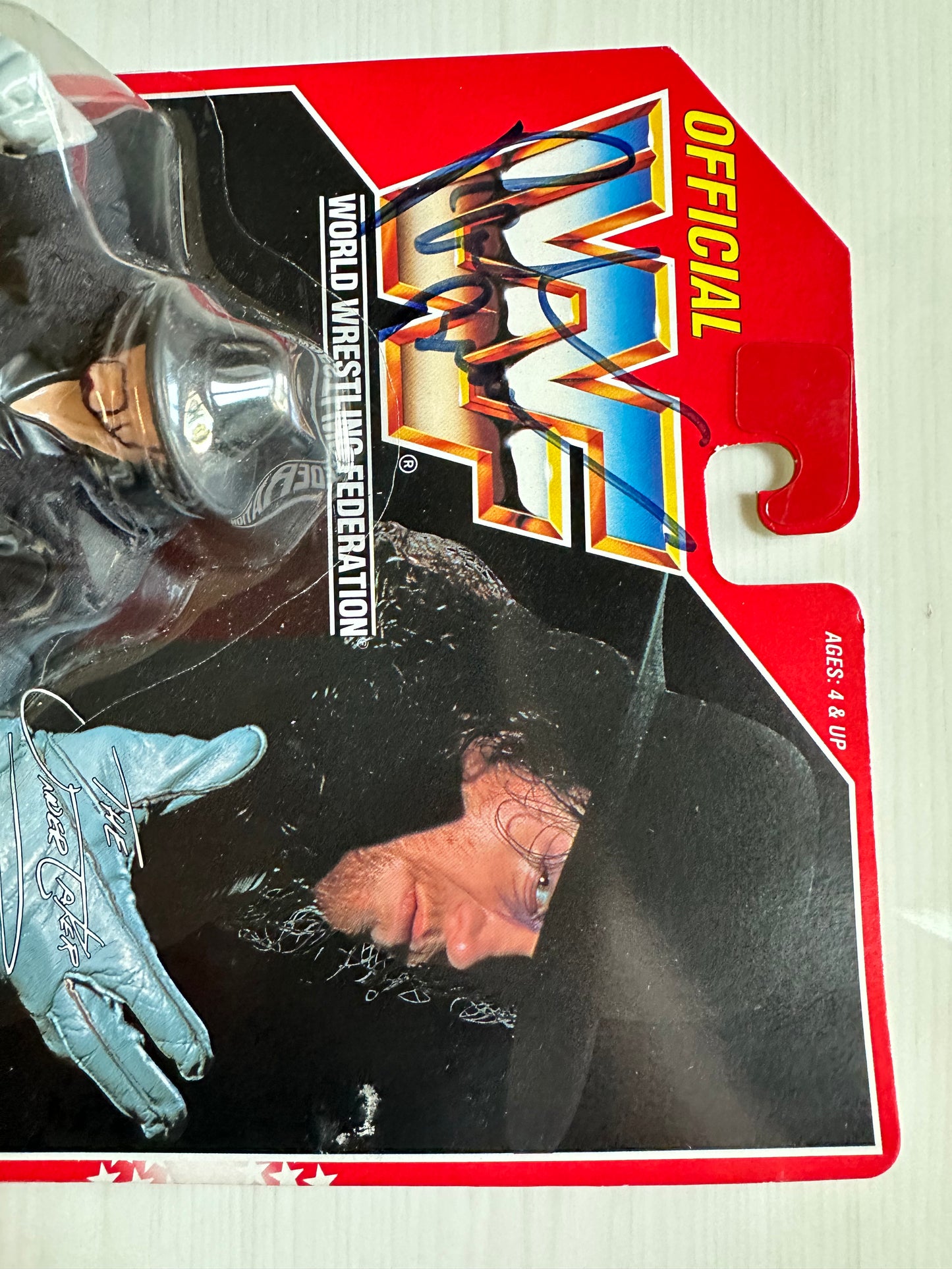 The Undertaker Series 8 WWF Hasbro MOC figure (signed by Paul Bearer)