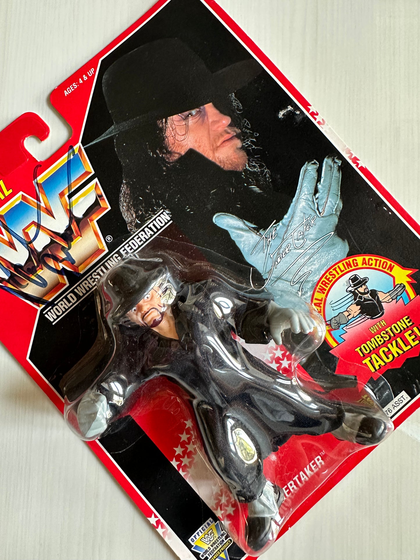 The Undertaker Series 8 WWF Hasbro MOC figure (signed by Paul Bearer)